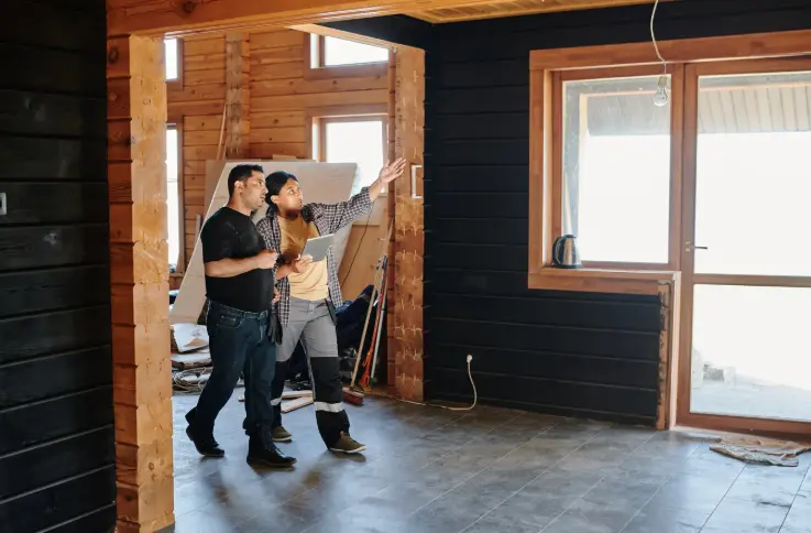 Professional property inspector reviewing comprehensive digital inspection report on tablet showing Dallas rental property assessment results and recommendations